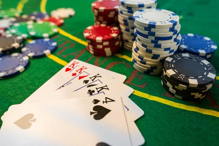 merdeka77 platform interface showing sportsbook and live-dealer games